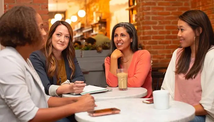 team at table smiling